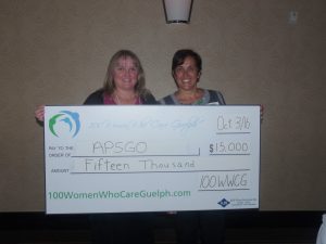Sharon Lewis presents our Meeting 9 donation to Rosemary Fernandez-Walker, nominator of the Guelph chapter of Association of Parent Support Groups of Ontario (APSGO), 