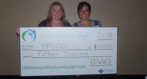 Sharon Lewis presents our Meeting 9 donation to Rosemary Fernandez-Walker, nominator of the Guelph chapter of Association of Parent Support Groups of Ontario (APSGO), 